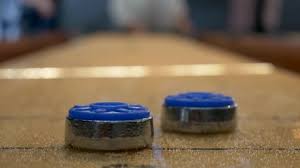 How to play knockoff shuffleboard: Shutterstock