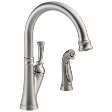 Magnatite® docking uses a powerful integrated magnet to snap your faucet spray wand precisely into place and hold it there so it stays docked when not in use and doesn't droop over time. Single Handle Kitchen Faucet With Spray 11949 Ss Dst Delta Faucet