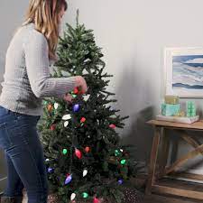 This Vertical Christmas Tree Lighting Hack Is The Easiest Way To Decorate Your Tree Video Video Christmas Decor Diy Dollar Tree Christmas Decor Country Christmas Diy
