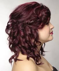 This wine colored hair looks fantastic on anyone and is perfect for the summer and winter seasons. Long Curly Dark Plum Red Half Up Hairstyle