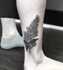 Top 20 Lilac Tattoo Ideas And Their Symbolisms Lilac Tattoo Tattoos Flower Tattoo Meanings