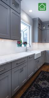 This beautiful yet simple beach house creates an instant emotional response to the lush landscaping & the sights and sounds of the neighboring ocean. Kitchen Garden Window Kitchen Remodel Design Kitchen Design Kitchen Cabinet Design