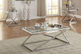 Vintage barn wood effect is heightened by metal frames with rivet head accents. 3 Piece Coffee Table Set