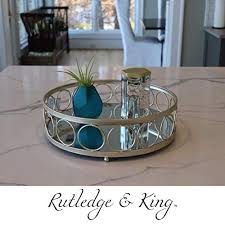 Any space shines with even more flair when using this gold mirrored tray to showcase your collection of jewelry, trinkets, or other precious items. Rutledge King Ottoman Tray Gold Mirror Tray Decorative Round Metal Tray Ornate Coffee Table Tray Serving Tray Chantilly Designer Tray Large Pricepulse