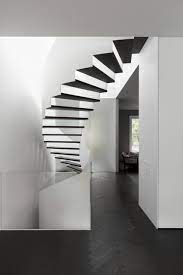 Maison Du Parc In Montreal Features Stark Interiors With Mysterious Depth Interior Stairs Space Architecture Brick Architecture