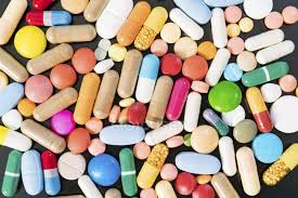 Easy color range of 20 colored hard gelatin capsule options in size 0 and 00; Multicolored Pills And Capsules On Black Background Pharmaceutical Pharmacy Stock Photo 194415546