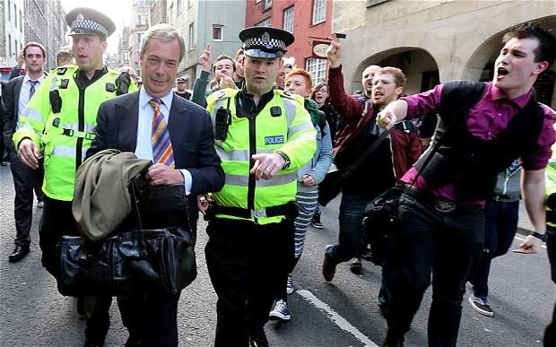 Nigel Farage barricaded in Scottish pub and rescued by police riot van