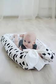 Put in the correct prepositions or adverbs. Affordable Dock A Tot Alternative Baby Nest Newborn Bassinet Newborn Gift Idea Baby Gift Baby Shower Gift Baby Nest Baby Boy Bedding Baby Nest Bed