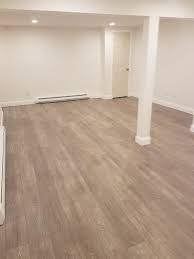 I was impressed with the system. Coretec Wide Plank Vinyl Flooring Over A Concrete Slab In Basement Basement Boston By Flynn High Performance Llc Houzz
