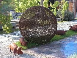 Kunst Galabau Richter Glashaus Skulpturen für den garten aus edelstahl, granit und rheinkies in handarbeit gefertigt.