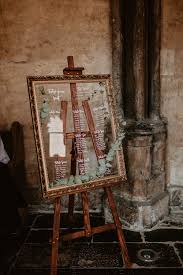 Norwich Cathedral Wedding Contemporary Atmospheric With Perspex Signage Greenery Wedding Table Plan Wedding Table Seating Plan Table Arrangements Wedding