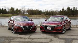 The 2021 nissan altima isn't the most alluring or exciting family sedan, but it's competent and available with some unconventional options. 2019 Nissan Altima Vs Honda Accord Comparison Autoguide Com