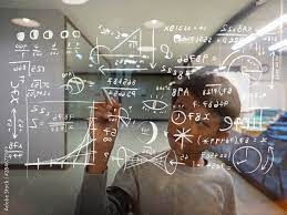 Young Asian Boy Writing Mathematical