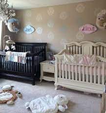 You don't need to buy everything twice. 5 Stylish Twin Nursery Ideas These Moms Get The Thumbs Up Nursery Twins Twin Nursery Room Boy And Girl Shared Room