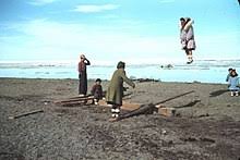 Playground apparatus consisting of a long plank balanced at the center so that one end rises as the other end descends (one child sits at each end of the plank); Seesaw Wiktionary