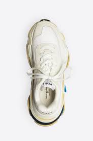 Balenciaga triple s trainers red deadpool color way seen at london spring 2019 menswear fashion week. Balenciaga Updates Trendy Triple S Sneaker For Spring 18 Footwear News