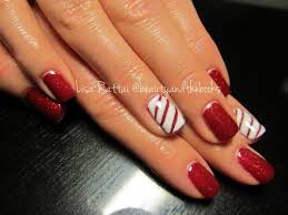 Red Shellac With An Accent Nail Done In A Candy Cane Adorable Christmas Nails Nail Artist Lisa Rattai T Red Shellac Nails Candy Cane Nails Christmas Nails