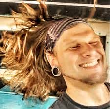 What are some good songs that are not rebassed or bass boosted that get low  and have good bass. Music type any