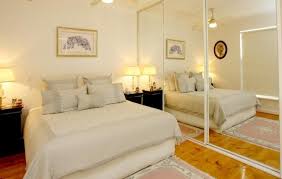 Having a small room can be a pain. 7 Ways To Make A Small Bedroom Look Bigger Realestate Com Au