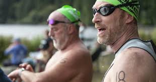 Open water swimmers take to Eel Lake