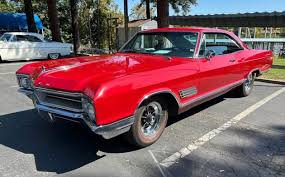 Image result for Riviera Red 1966 Buick