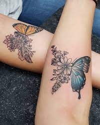 Halves Of A Butterfly Blue Yellow Flowers Forearm Tattoos Small Matching Tattoos In 2020 Tattoos For Daughters Friendship Tattoos Matching Best Friend Tattoos