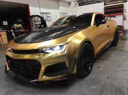 chevrolet camaro zl1 1le painted in summit white and wrapped in satin chrome gold photo taken by moezl1le chevrolet camaro zl1 chevy camaro chevrolet camaro chevrolet camaro zl1 chevy camaro