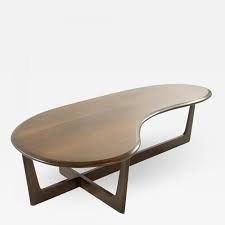 Niklaus 47 oval coffee table in american walnut and black the niklaus coffee table adds a modern elegance to any room. Asymmetric Mid Century Modern Walnut Coffee Table