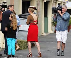 That's not very ladylike! Zara Phillips shows off a racy red bra ...