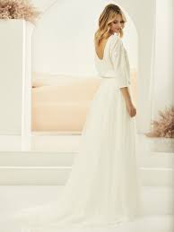 Unsere designer brautkleider gehen von romantischen tüll prinzessinnen kleidern mit viel spitze. Tull Brautkleid Rock Ivory Mit Schleppe Calypso Von Bianco Evento Brautkontor