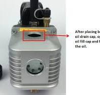 When should you change oil in the vacuum pump?