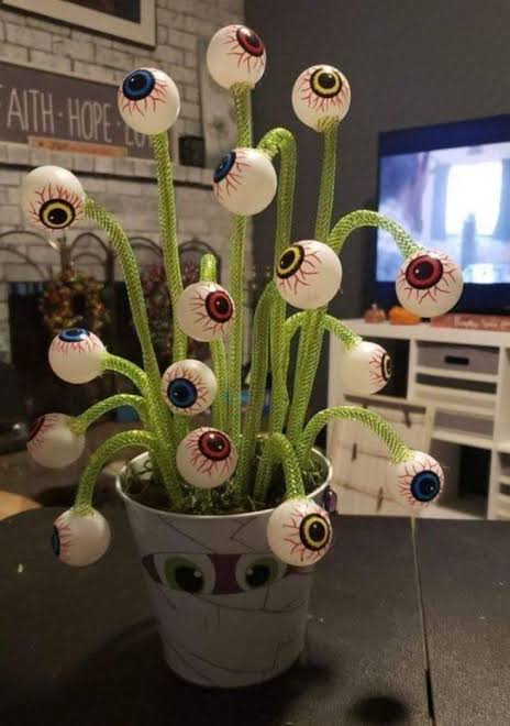 Creepy decorations for halloween party | Scary office decor, Decorating for halloween party office, Dollar tree