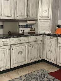 Pin By Bren Soa On Iod N Prima Mixed Media Art Distressed Kitchen Cabinets Rustic Kitchen Kitchen Cabinet Design