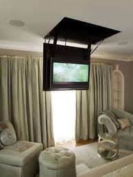This exceptional ceiling tv mount tilts up to 20 degrees, swivels 360 degrees and it extends from 22 to 31.5 from the ceiling to help you optimize your viewing angles from anywhere in the room. The Great Cover Up 7 Ways To Disguise Your Tv Tidbits Twine Tv In Bedroom Home Home Decor