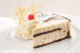Fudge Picasso Slice A White Chocolate Mousse Loaded With Chunks Of Home Made Fudge Coated With A White Chocolate Gana Delicious Desserts Sweet Recipes Baking