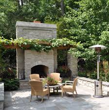Brown pigeon standing on the balcony fence in the shadow of green vine. Grape Vine Patio Ideas Photos Houzz