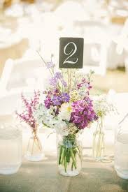 15 Summer Wedding Centerpieces You Ll Fall In Love With Mywedding Summer Wedding Centerpieces Wedding Flowers Summer Wedding Centerpieces
