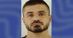 Ohio man gets life sentence after cutting off mother's head, setting body 