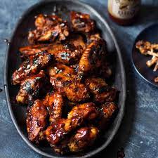 Smoky Rubbed Chicken Wings With Honey Bourbon And Molasses Sauce Recipe Chicken Wing Recipes Baked Food Network Recipes Chicken Wings