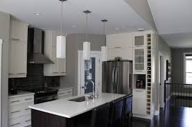 a compact kitchen and corner pantry are