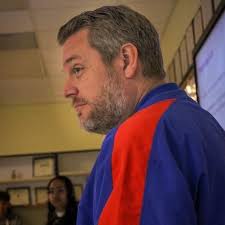 Harrison Hove, senior lecturer and interim chair of the Journalism  Department at the University of Florida, along with two of his students,  visited with journalism and media studies students at Bayshore High