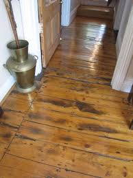 Exposed Wooden Floorboards In The Living Room Maine House Flooring Brick And Wood