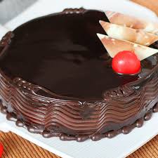 A true showstopper, our chocolate indulgence cake has four layers of chocolate cake filled with delicious chocolate buttercream and is topped with creamy white chocolate ganache. Order Soulful Chocolate Indulgence Cake Online Price Rs 599 Floweraura