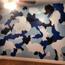 My Sis Is Awesome And Did This To My Nephews Room Blue Camo Room Boy Room Paint Camo Rooms Blue Camo Room