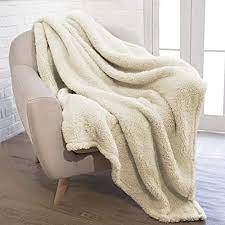 With an attractive plaid design in blue or red complemented by a fluffy white trim, the throw adds a rustic accent to any space. Amazon Com Pavilia Fluffy Sherpa Throw Blanket For Couch Sofa Plush Shaggy Fleece Blanket Soft Fuzzy Cozy Warm Microfiber Throw Solid Blanket Cream Ivory Beige 50x60 Home Kitchen