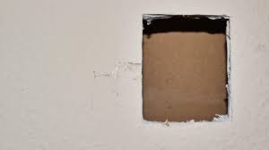 I have a wall that has drywall on furring strips on a cinder block/concrete wall behind it. How To Fix Holes In Drywall Gypsum Board Or Concrete Eminetra Canada