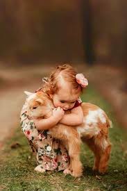 Kucuk Cocuk Ve Keci Yavrusu Animals Beautiful Nature Goats