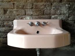 vintage 1950s pink bathroom sink with