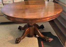 A circular dining table that expands when rotated. 1900 1950 Antique Round Dining Table Vatican