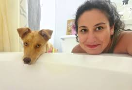 Emory Paul is late this year. Floral clients dog isn't quite sure of big  flowers! 😂